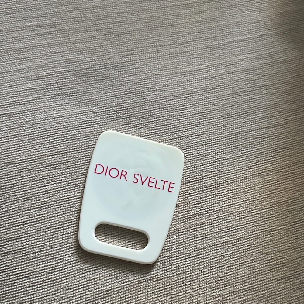 Dior Svelte White and Red compact mirror.